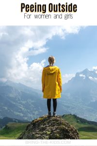 woman overlooking mountains summit woman