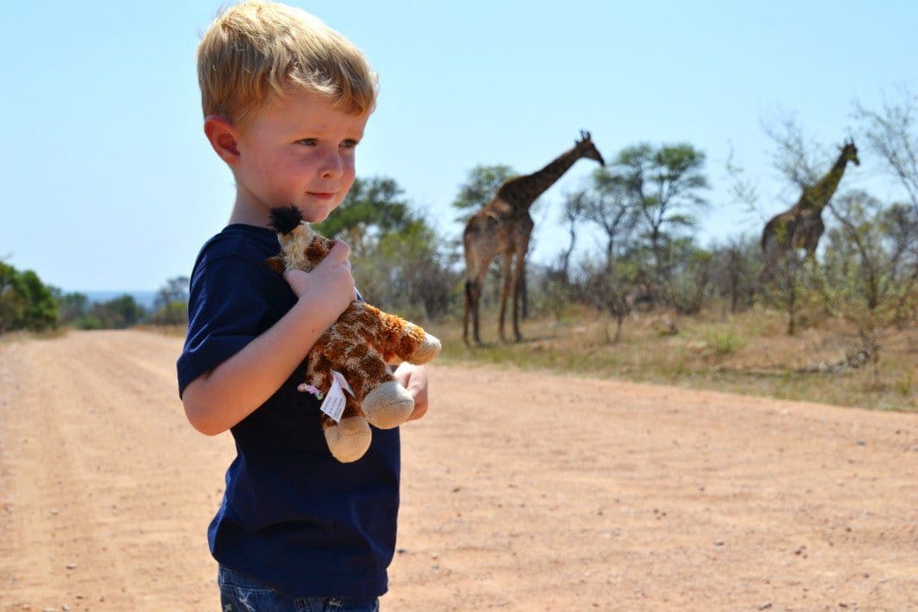 boy with giraffe