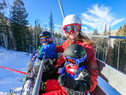 kids and mom on chairlift