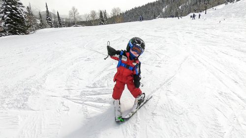 little boy skiing