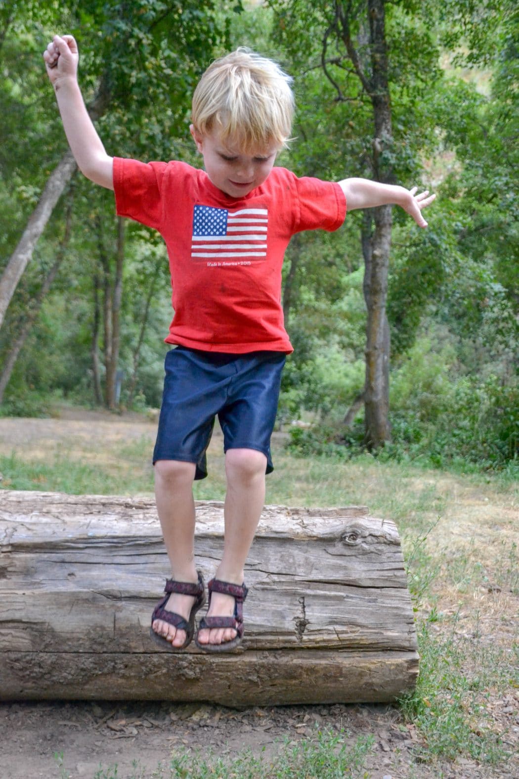 boy exploring with Teva sandals