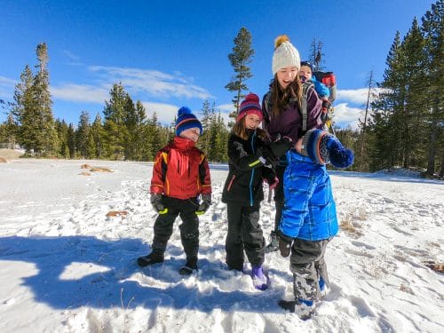 family in winter in the snow