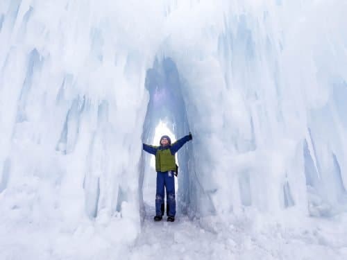 kid touching ice castles