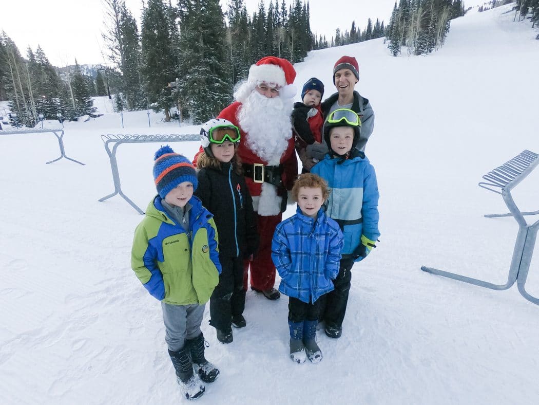 santa with kids and snow skiing