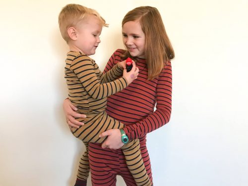 baby and girl talking 