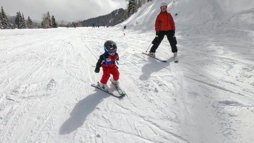 baby skiing with mom