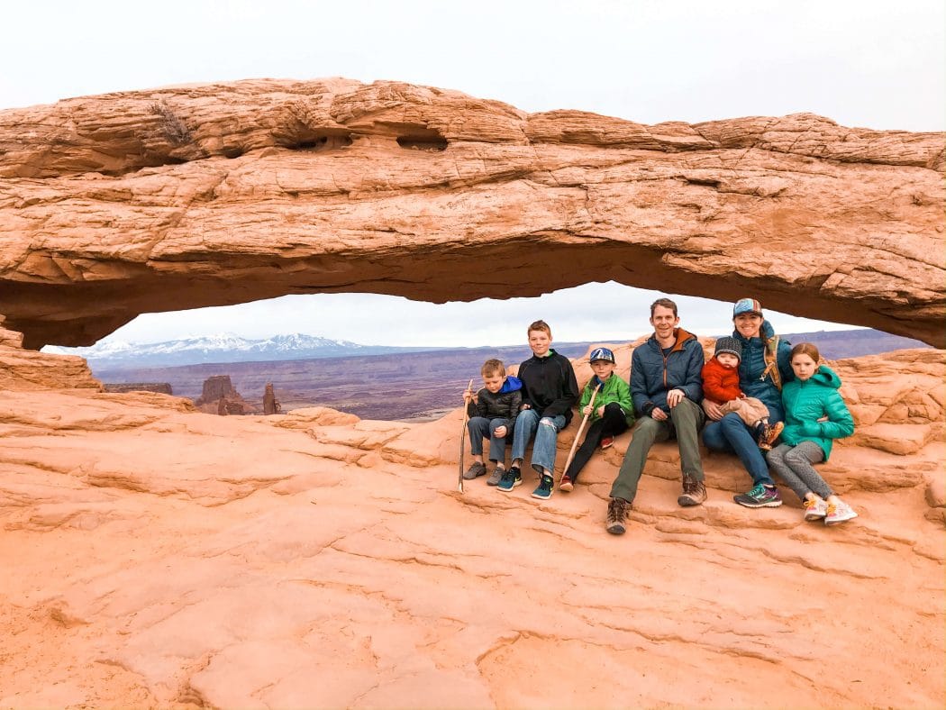 family in canyonlands national park mesa arch