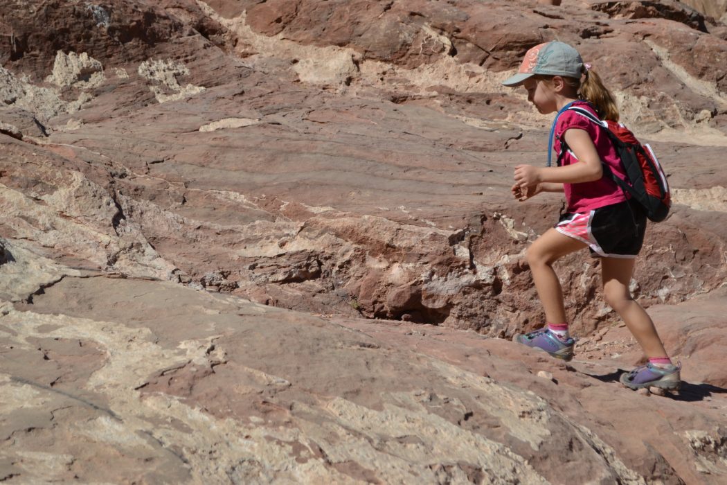 little girl with hydration pack