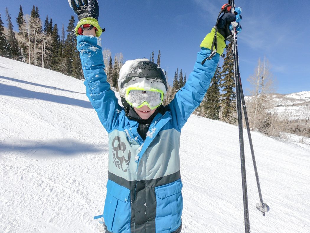 Boy skiing snowy