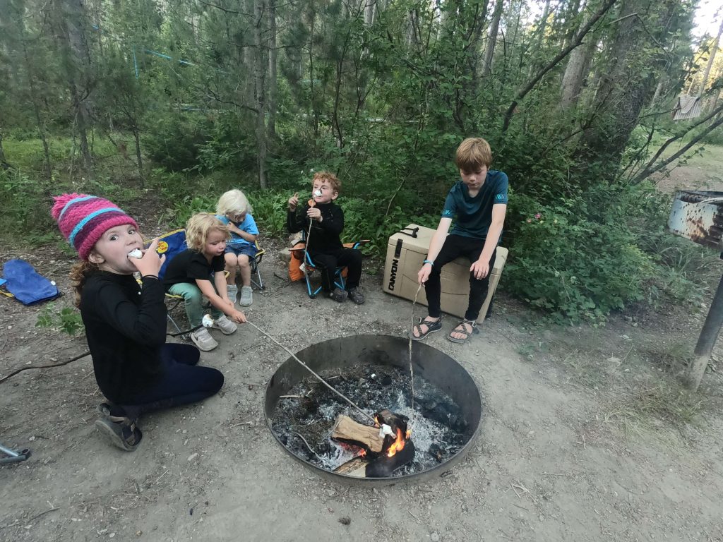 cooking over a campfire with kids