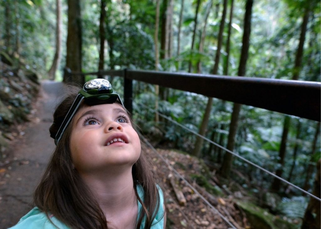 little girl with headlamp