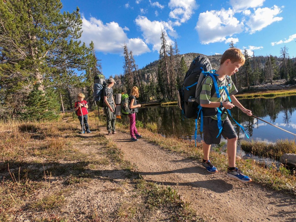 family backpacking with young kids