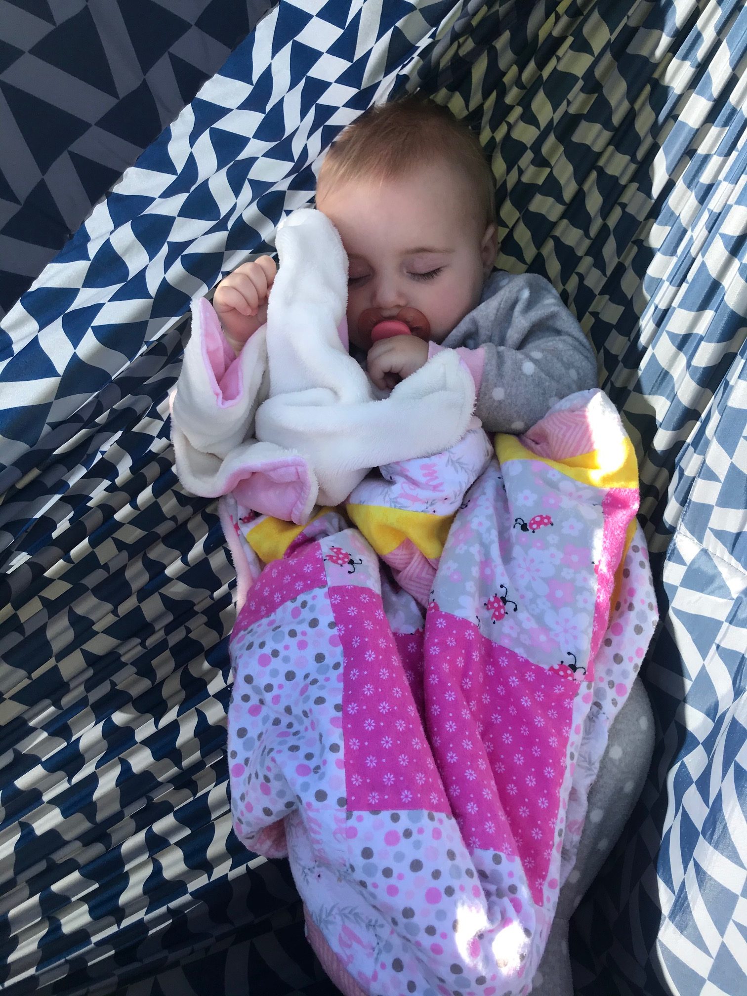 baby sleeping while camping