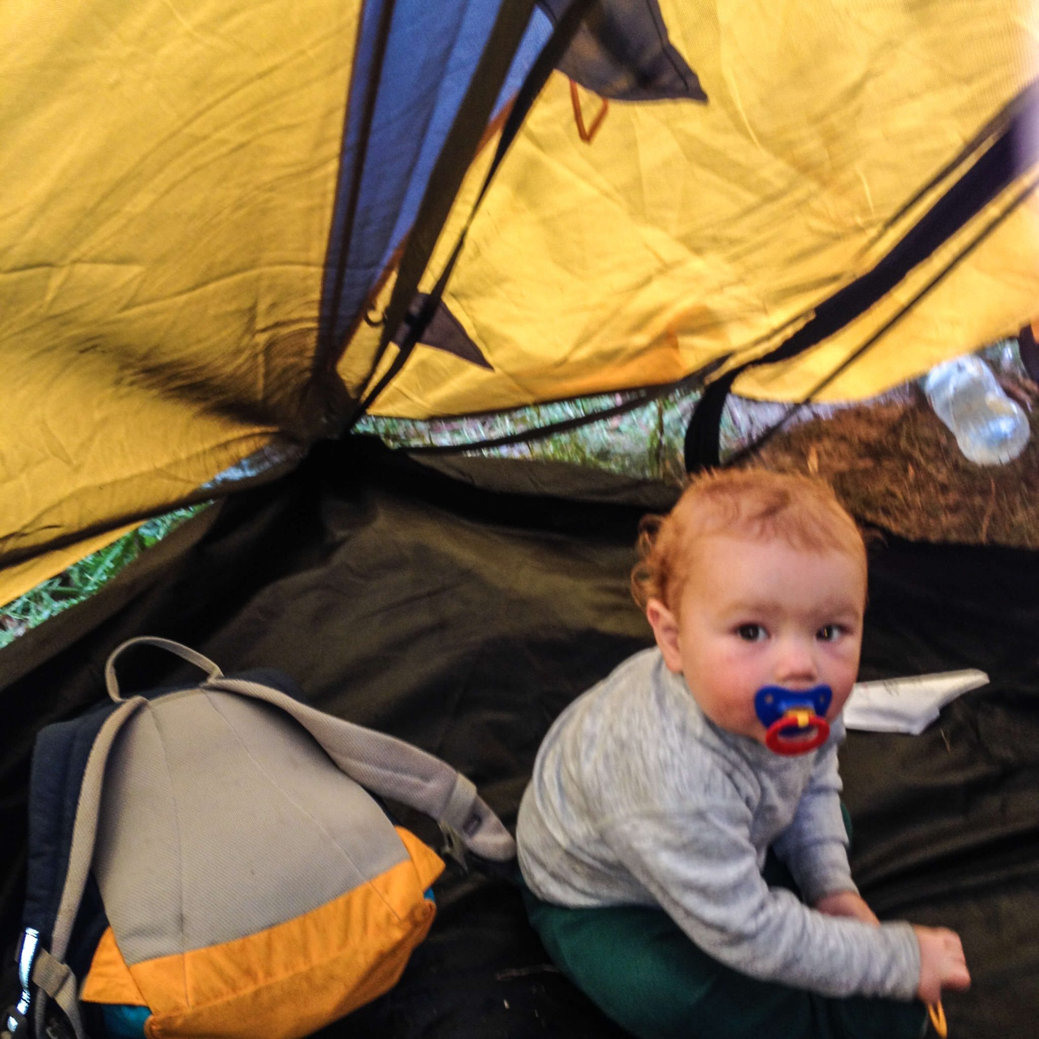 baby camping in a tent