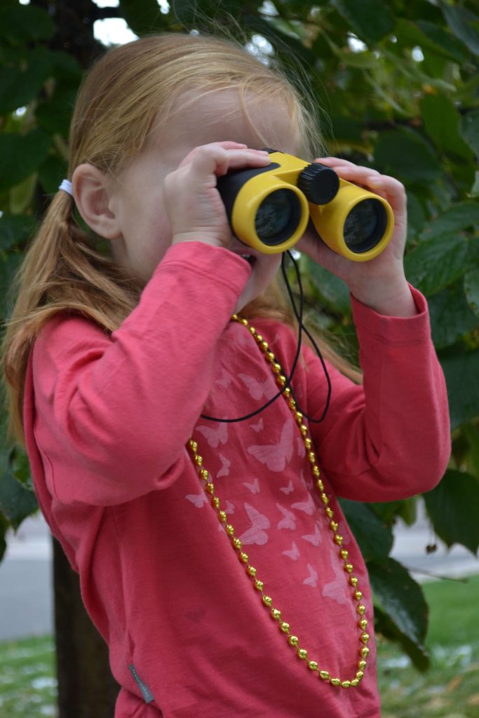 girl with binoculars