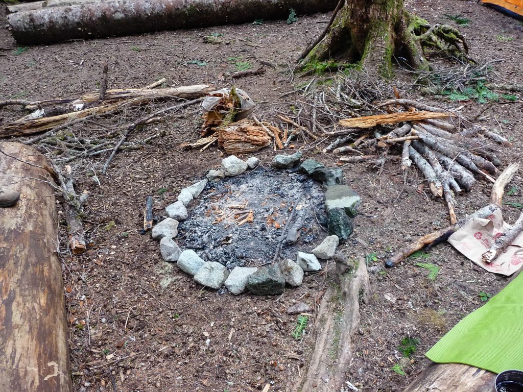 pile of firewood and kindling to start a campfire