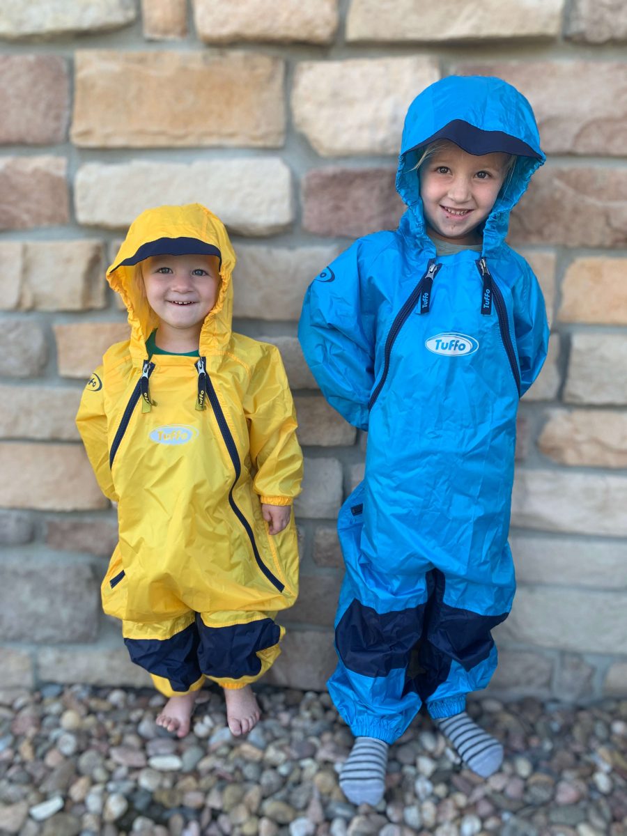 Toddlers playing in rain in Tuffo Muddy Buddy Coveralls