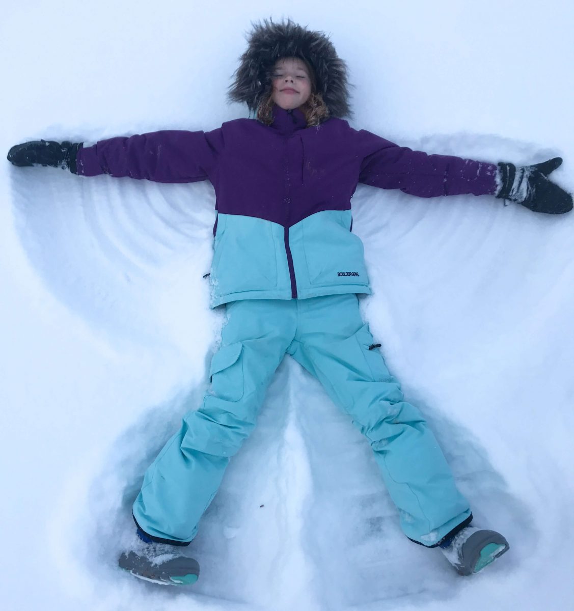 girl snow angel